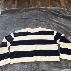 Divided Black and Cream Striped Sweater
